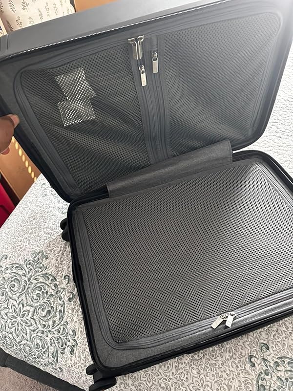 Level8 Textured Luggage Set Review: Durable & Stylish Travel 7 Interior view of the Level8 suitcase showing mesh dividers, zipper pockets, and compression features.