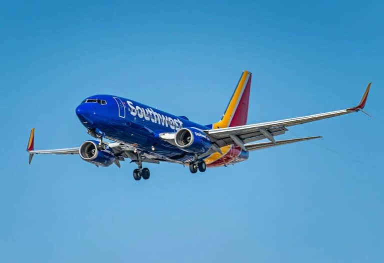 Southwest Airlines Boeing 737 aircraft in flight against a clear blue sky