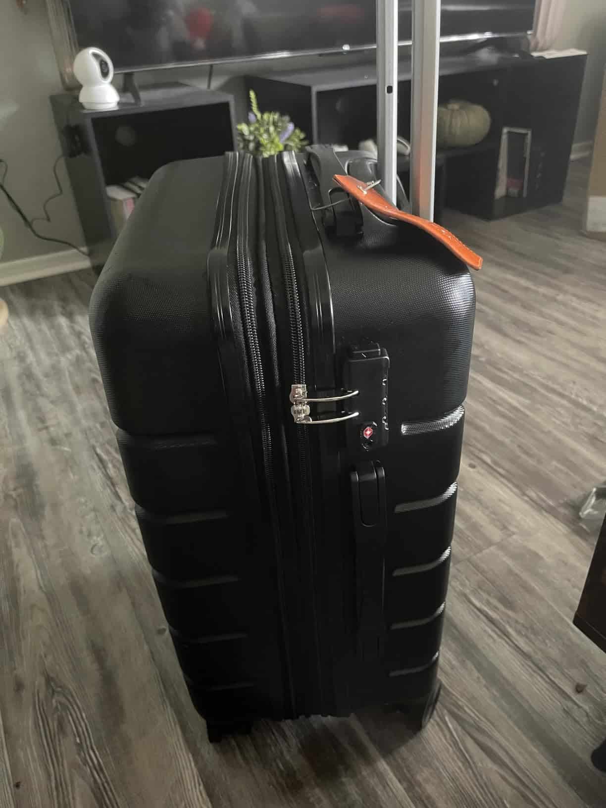 Sweetcrispy carry-on luggage with TSA lock, expandable zipper, and hard shell design in black