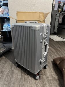 VentureVault zipperless carry-on luggage 20 inch silver aluminum frame suitcase with TSA lock and spinner wheels