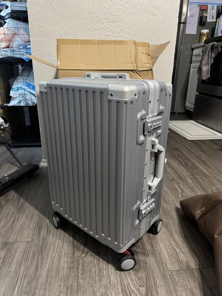 VentureVault zipperless carry-on luggage 20 inch silver aluminum frame suitcase with TSA lock and spinner wheels