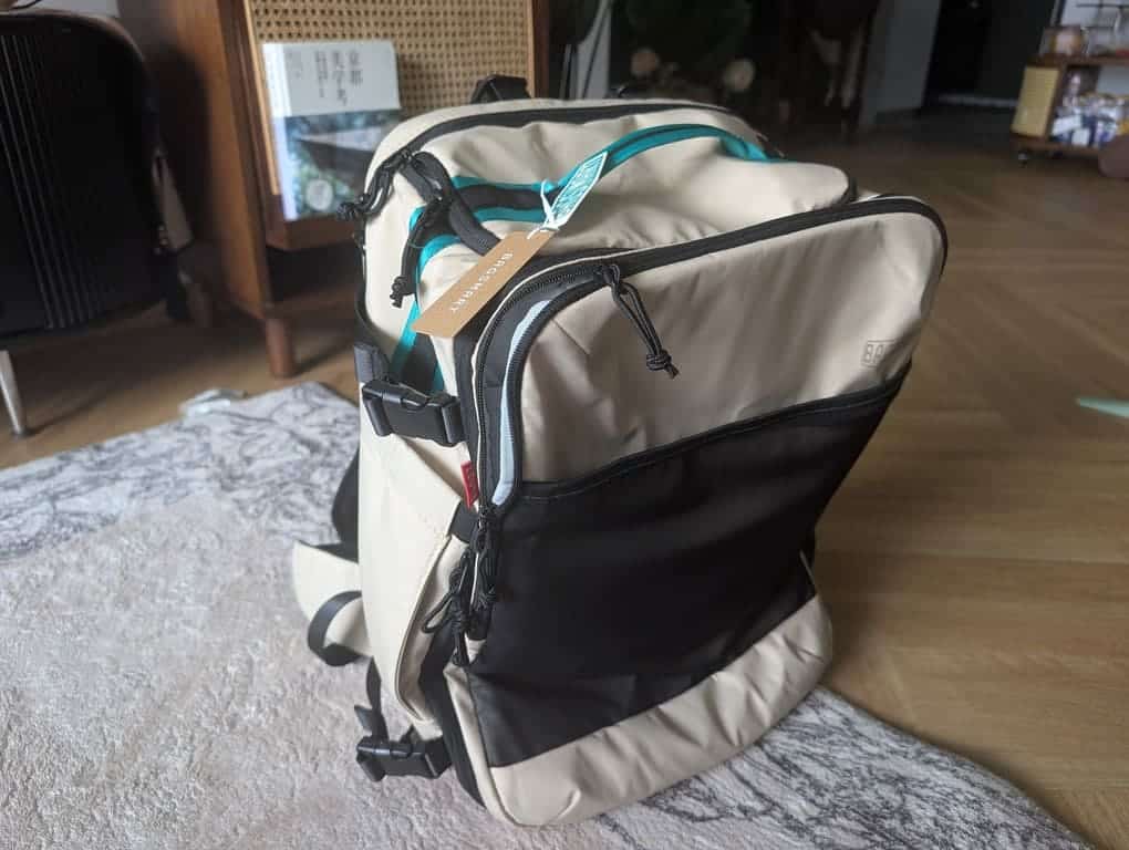 BAGSMART Blast Pro 40L Travel Backpack Review: A Surprisingly Smart Carry-On for One-Week Trips 11 Blast Pro 40L travel backpack standing upright in a living room travel setup