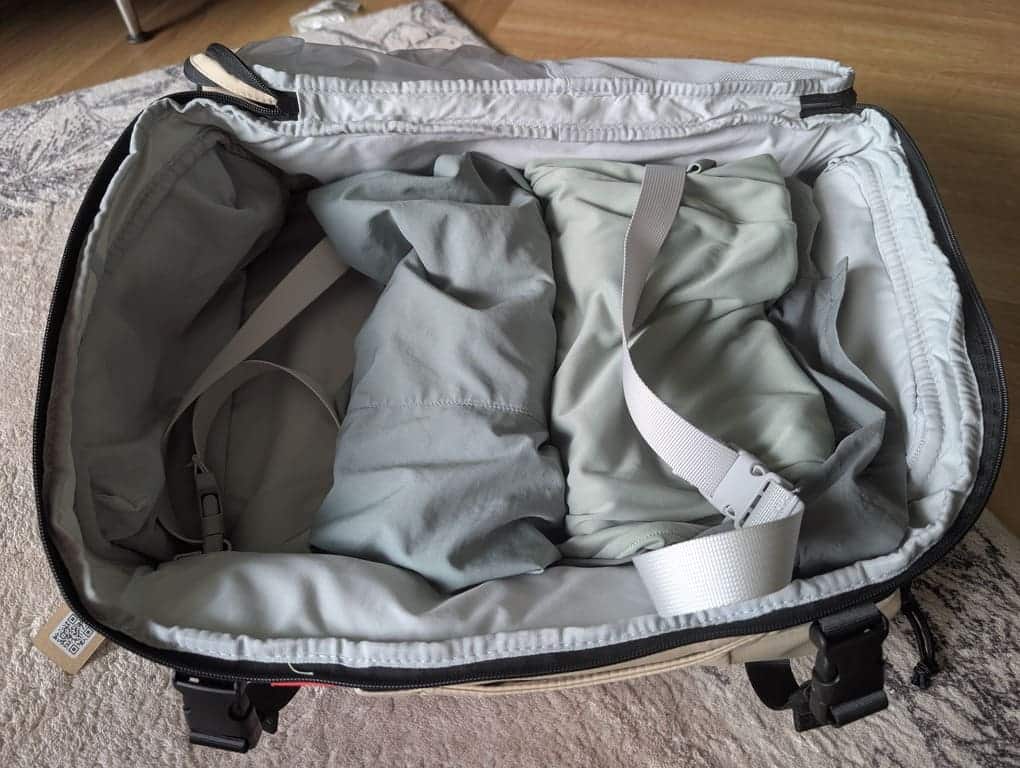 BAGSMART Blast Pro 40L Travel Backpack Review: A Surprisingly Smart Carry-On for One-Week Trips 10 Blast Pro 40L suitcase-style interior compartment packed with clothing and compression straps